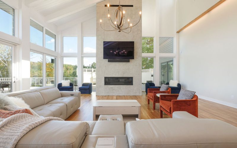 Transform your living room's aesthetic with a modern chandelier, like the one pictured here.